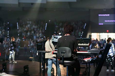 Talented music team leading worship with song and music