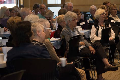 50+ Group listening to a guest speaker