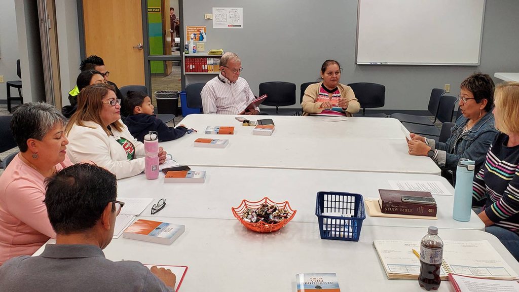 Small group participating in a Bible class