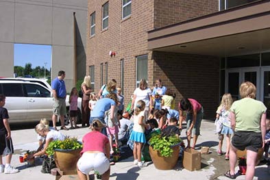 Families working together to maintain and beautify Hope's grounds