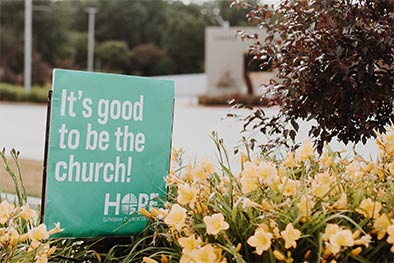 Yard sign reading "It's good to be the church!"