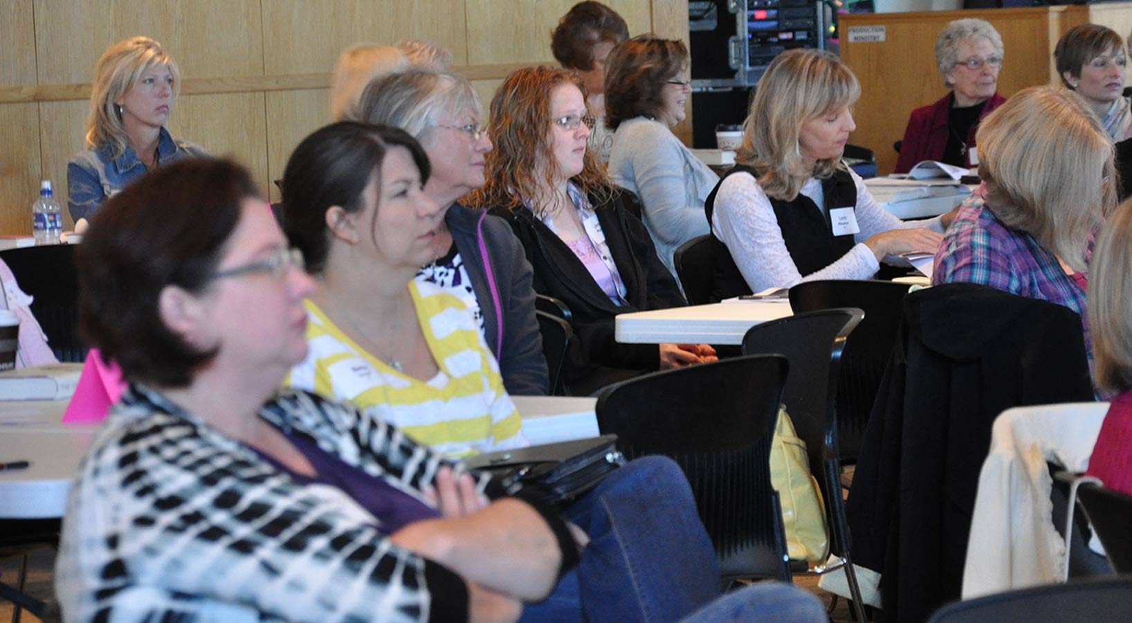 Women listening to speaker during a Women's workshop