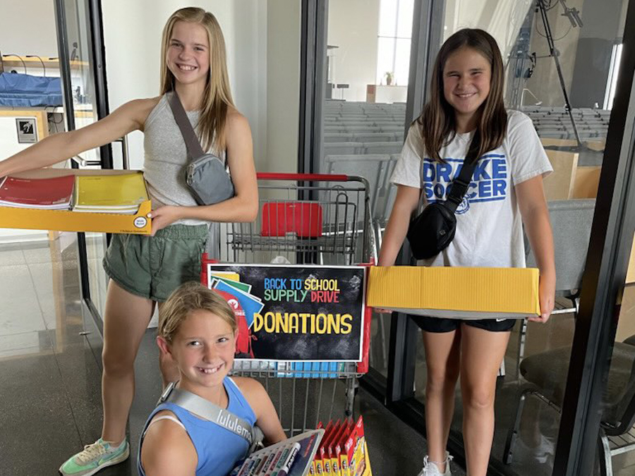 Kids donating to school supplies for the Ankeny Prison Fellowship