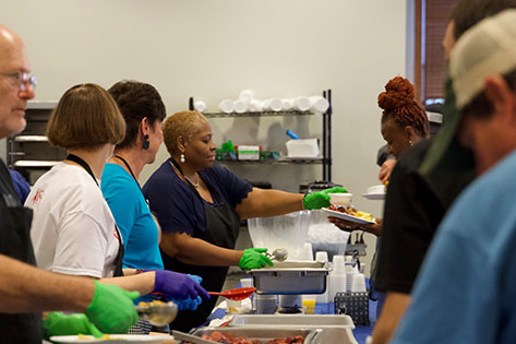 team serving a meal