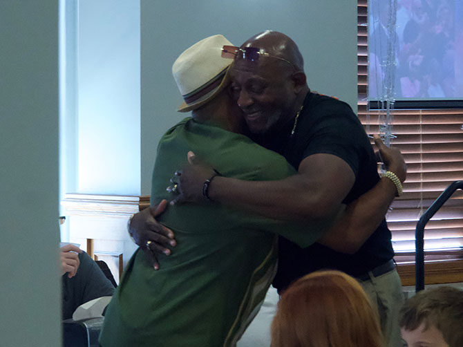 two men hugging