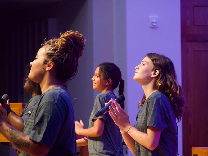 students leading worship