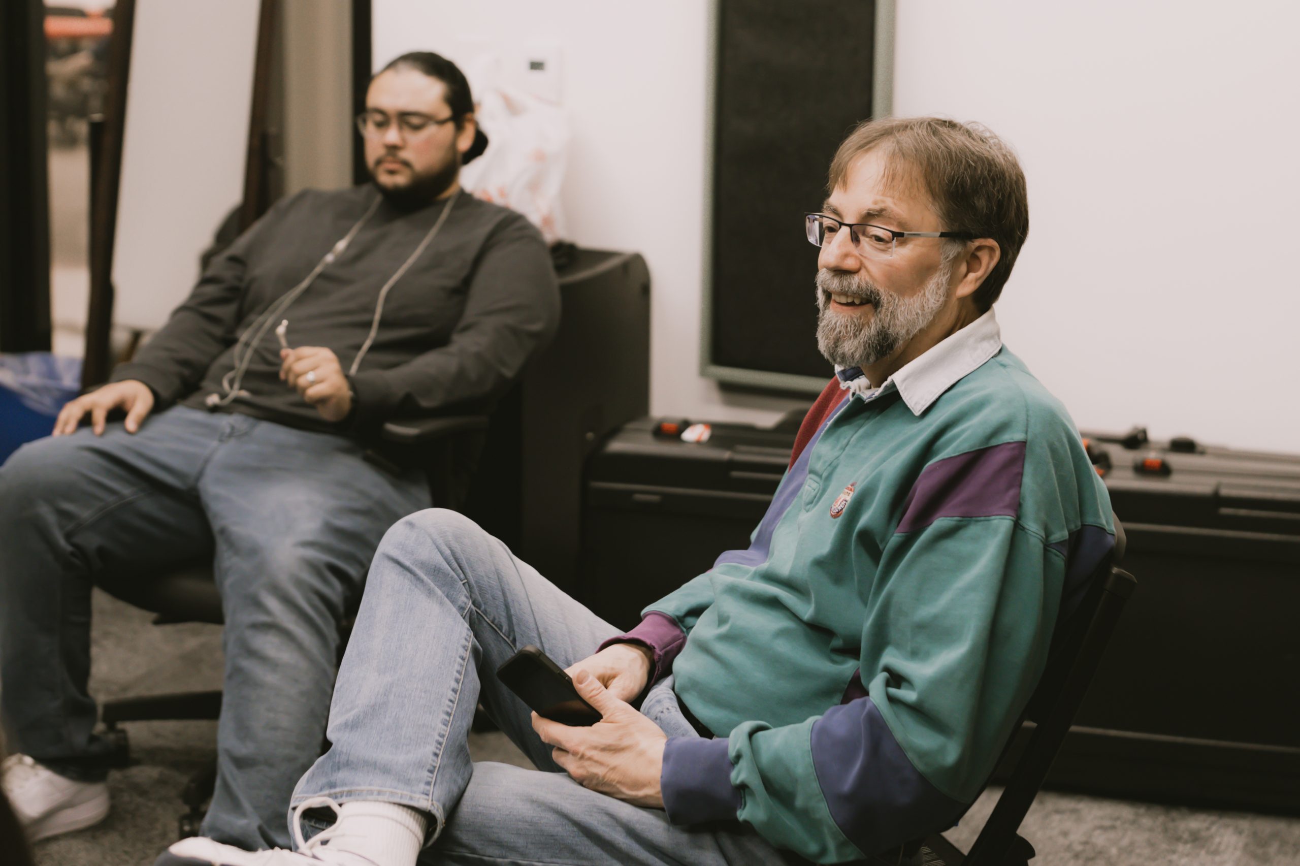 Men involved in a small group talking to their group members