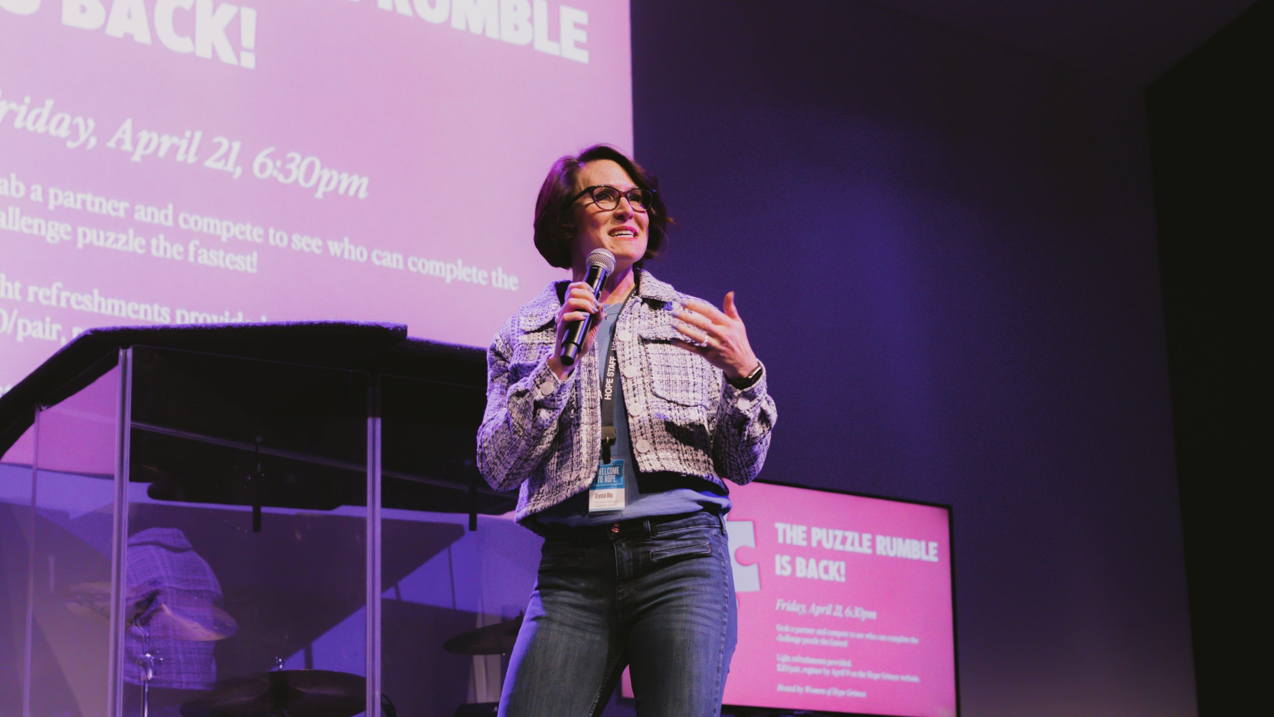 Women's Ministry leader talking during worship event